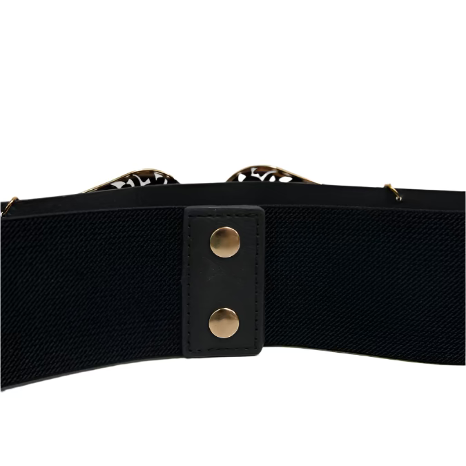 A black belt with gold-colored double buckles and a decorative element in the center, displayed on a white marble background.