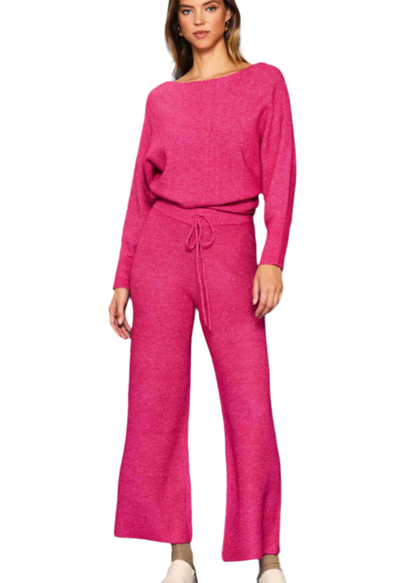 Woman wearing a pink outfit on a white background