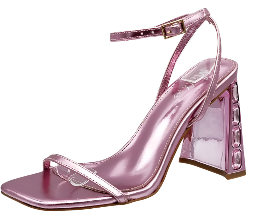 A pair of pink block heel sandals with ankle straps and a square toe.