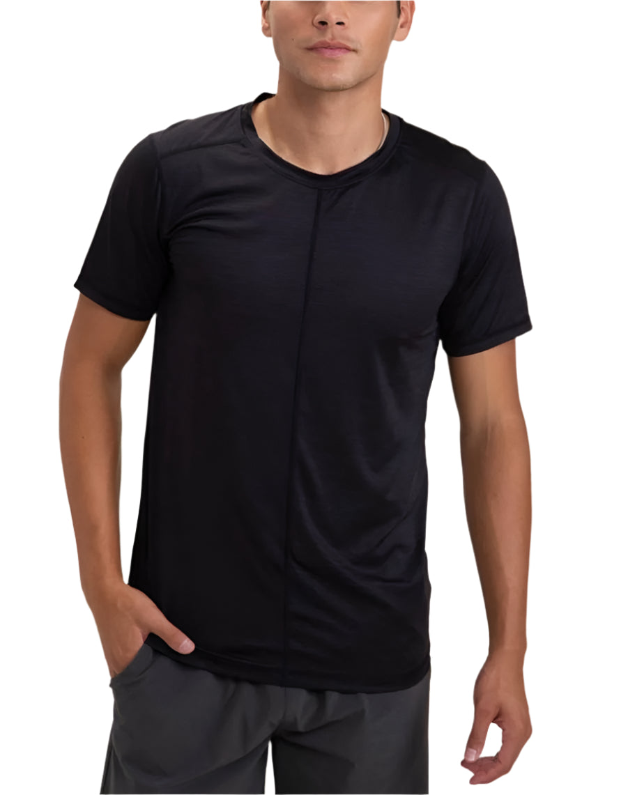 A man wearing a black short-sleeved crew-neck t-shirt.