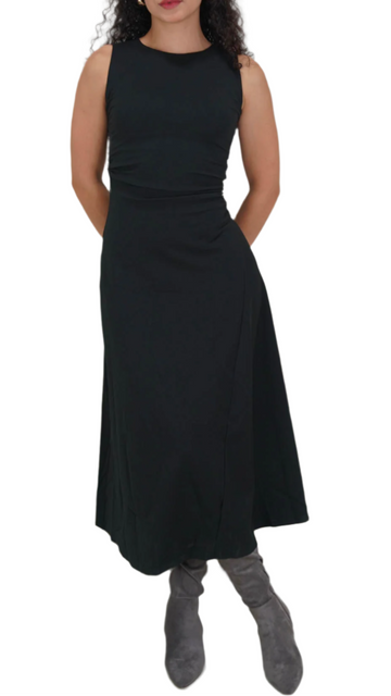 Woman wearing a black sleeveless dress on a white background