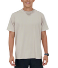 Man wearing a beige t-shirt and black shorts on a plain background