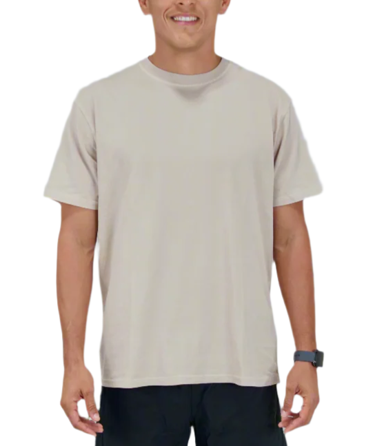 Man wearing a beige t-shirt and black shorts on a plain background