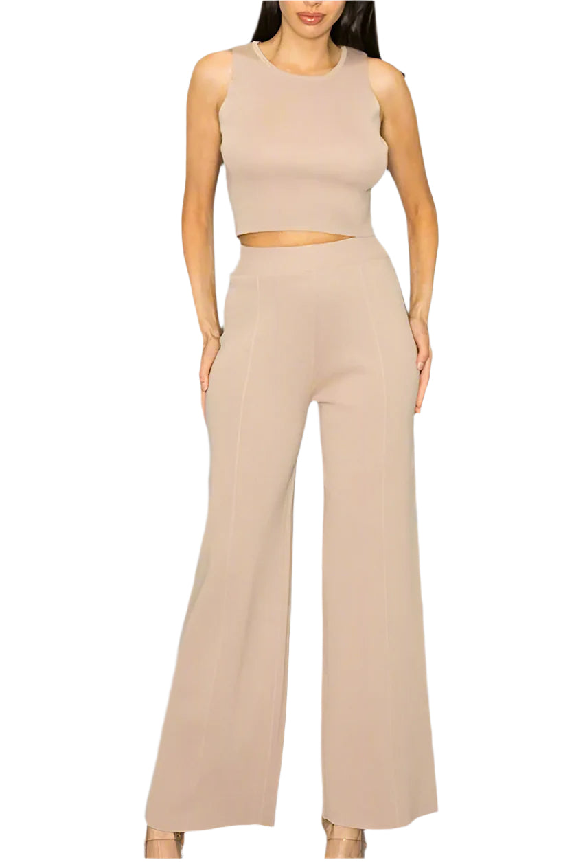 A sleeveless, cropped top and high waist pants set in a mocha color, with elastic waistband on the pants.